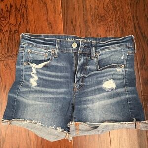 American Eagle Outfitters Distressed Blue Jean Shorts size 8 mid rise 9” stretch